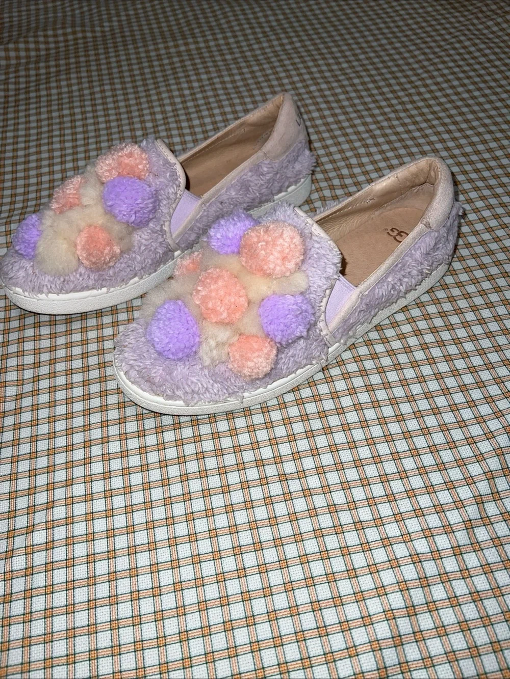 UGG Lavender Pom Pom Slip-On Sneakers with Pastel Pom Accents